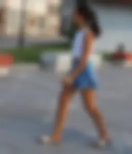 Skinny girl wearing shorts on the street