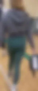 Tiny Asian leaving the gym in green leggings