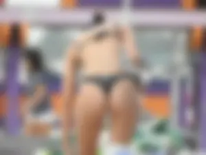Beach girl with an incredible ass in a black thong