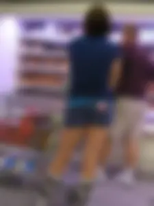 Pretty girl grocery shopping in short shorts