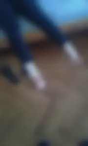 Feet closeup of a girl lying on bed