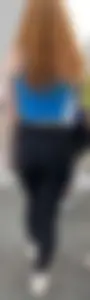 Ginger in tight black leggings