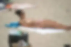 Sexy candid topless and nude beach girls
