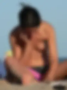Sexy girls going topless at the beach showing off their sexy bodies