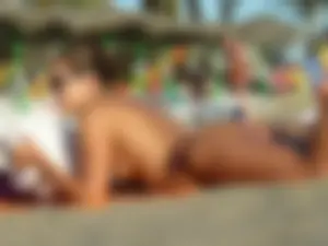 Sexy ass girl topless on the beach with a nice ass in a thong bikini