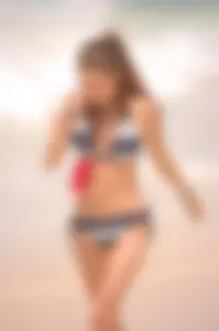 Bunch of sexy girls and milfs in bikinis at the beach