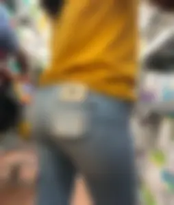 Hot brunette babe in tight jeans with a big booty and vpl