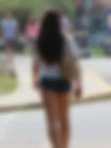 Denim short babe with a wedgie showing some cheeks