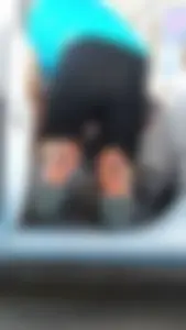 Girl in tight see through leggings with nice ass cleaning her car