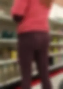 Target milf with a decent ass in maroon leggings