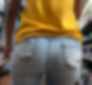 Hot brunette babe in tight jeans with a big booty and vpl