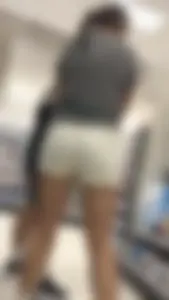 Amazing Asian in white yoga shorts upshot bends squat at Target