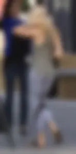 Hot blonde in light leggings after getting Starbucks