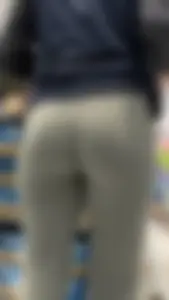 Sports store blonde worker in nice leggings