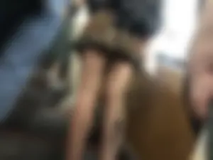 Candid Girl in a Skirt With a Tattoo on Her Calf Subway Escalator Creepshots Gallery