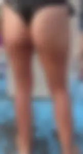 Beach shower milf in semi thong bikini with a nice ass