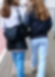 Two teens in blue jeans, one has a hot skinny ass