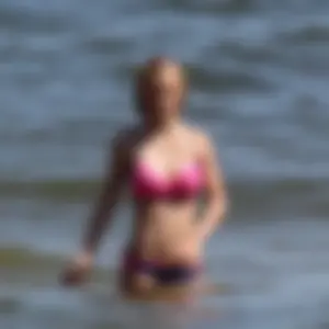 Two sexy beach teens in bikinis, one thick and one skinny with big boobs
