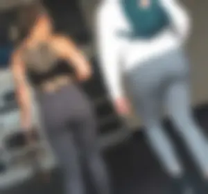 Tight ass in spandex with back Tattoo