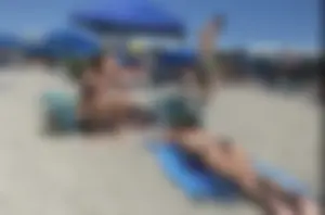 Hot candid lying on the beach creeps