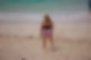 Assortment of sexy babes at the beach in bikinis