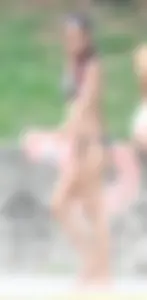 Sexy brunette milf in a bikini with a great body, nice ass and some camel toe