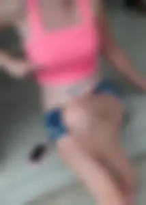 Friend in short shorts showing cheeks and some cleavage
