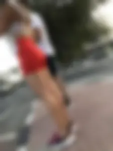 Hot candid chick in tight shorts with amazing hot legs waiting by the crosswalk street creepshot