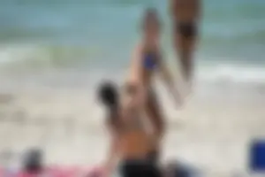 Sexy ass girl with a perfect body in her bikini on the beach