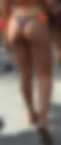 Great ass on blonde babe walking in thong bikini