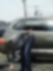 Girl cleaning her car in jeans and showing some cheetah print underwear