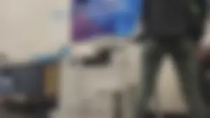 Green Lululemons Bent Over at Fedex