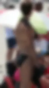Bunch of sexy babes at the beach in bikinis