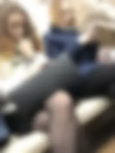 Very cute candid subway girl wearing black pantyhose sitting with crossed legs in the train