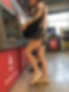 Candid Girl With Nice Skinny Legs in Shorts at the ATM Photos