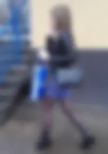 Hot girl wearing a skirt, leather jacket and black pantyhose street creepshot - hot skinny legs