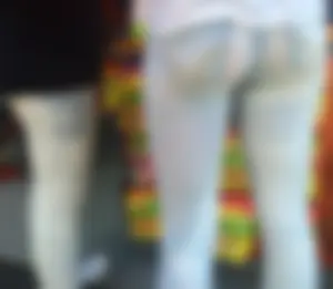Girl in wet jeans making them semi see through