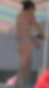 Bunch of sexy babes at the beach in bikinis