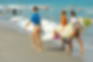 Candid surfers in bikinis