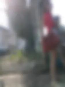 Girl in Mini Shorts and Sandals Candid