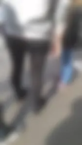 Girl wearing a black skirt over her leggings
