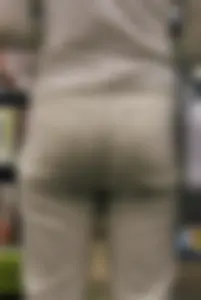 Milf’s Ass in the White Jeans Closeup at the Bookstore