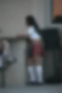 Two sexy Tilted Kilt employees showing cleavage and cheeks