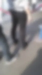 Girl wearing a black skirt over her leggings