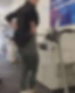 Green Lululemons Bent Over at Fedex