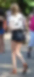 Skinny blonde chick in little denim shorts