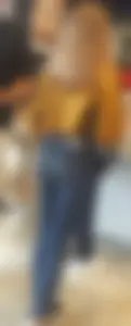 Young chick wearight tight blue jeans at the store creepshots