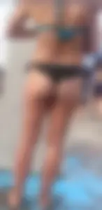 Beach shower milf in semi thong bikini with a nice ass