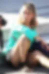 Blonde lady upskirted showing her panties and pussy lips