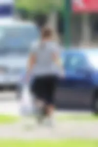 Thick girl out walking in black leggings